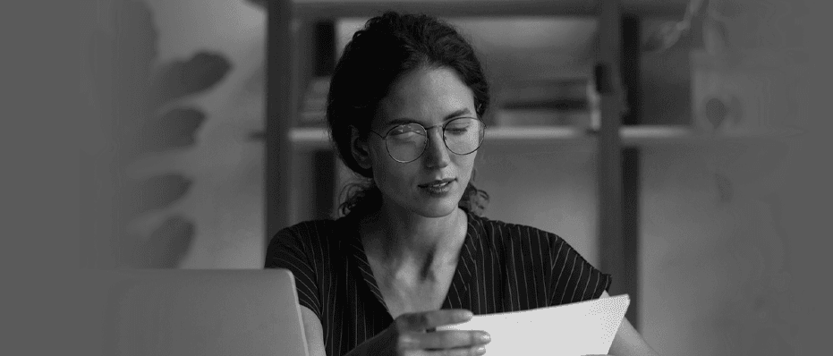 woman sorting through papers