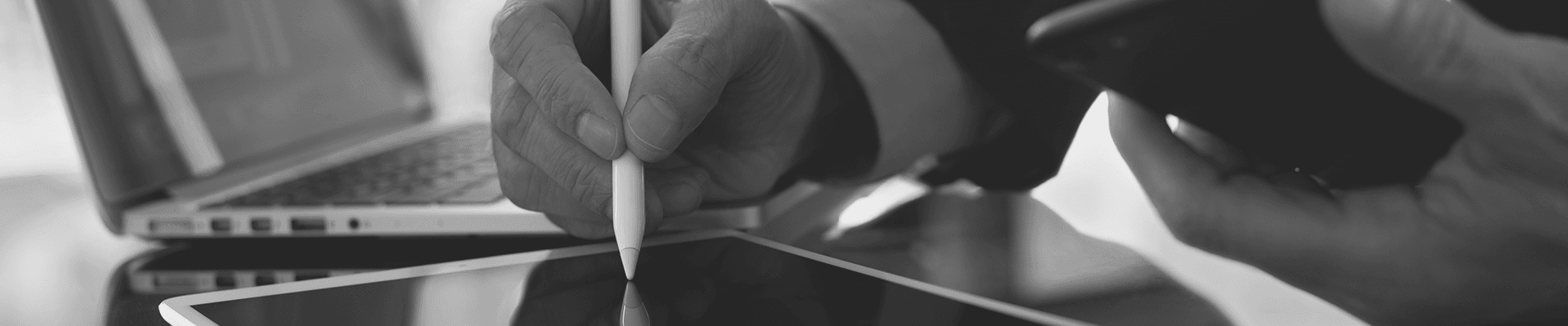 pen writing on a tablet