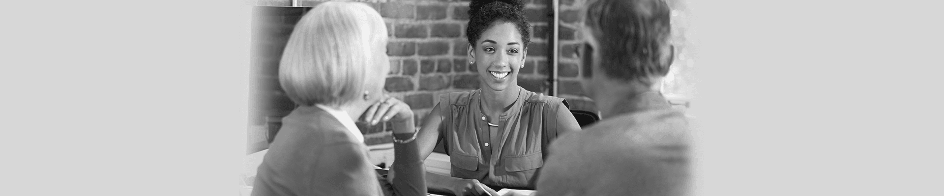 woman smiling working with her customers